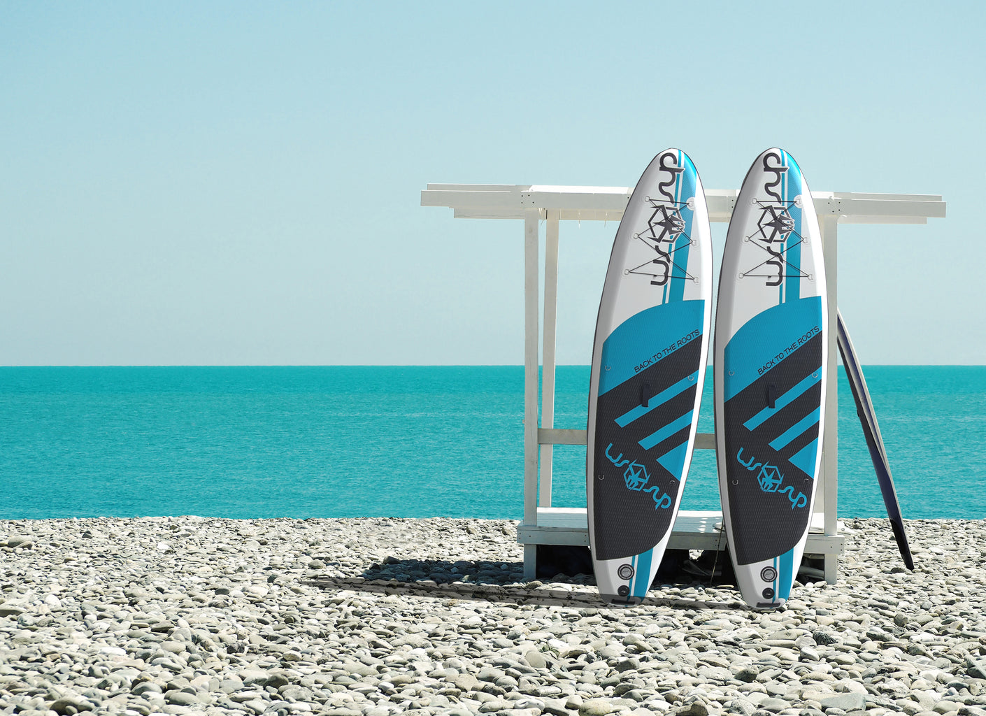 Water Strider SUP two paddleboards on the beach